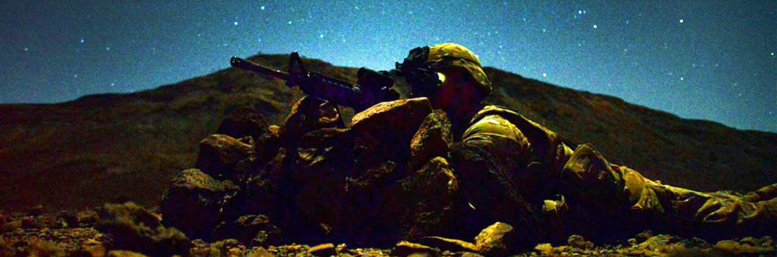 A lone Soldiers provides security in the night.