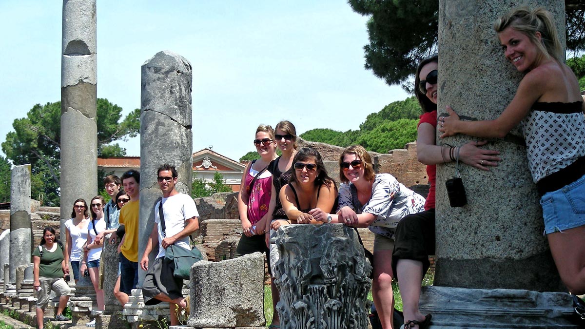 Students Pose with Ruins