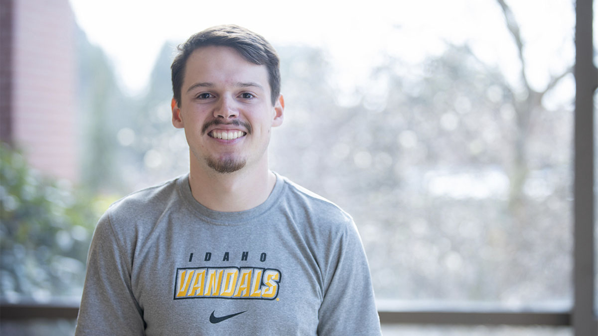 CALS student Gavin Merritt poses for a photo in the Albertson’s Building at the University of Idaho.