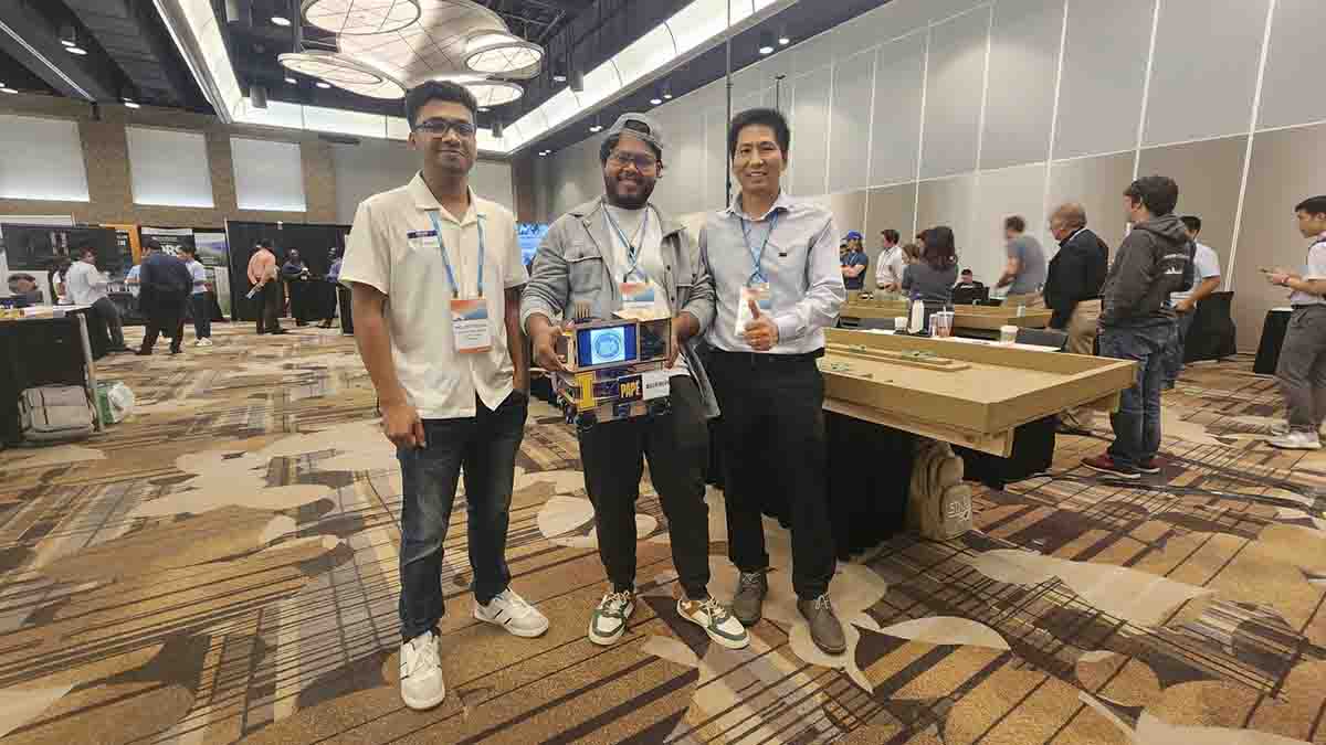 Group photo of participants in a robotics competition.