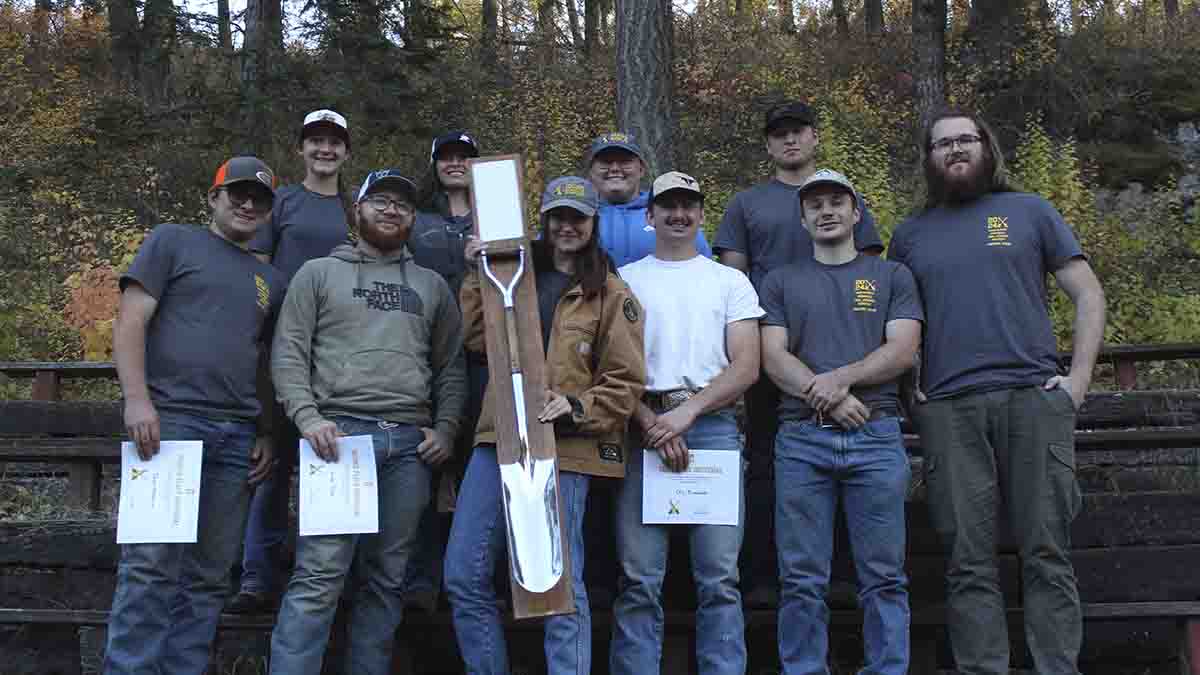 Soil judging team with an award.