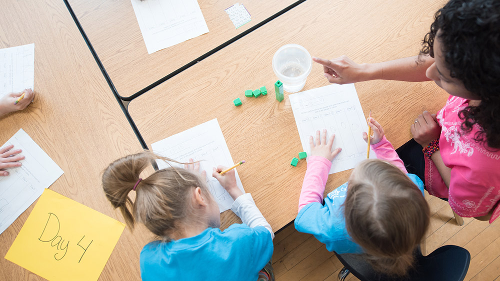 Children doing school work.