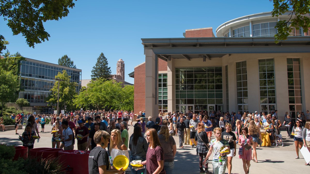 A group of students gathered outside the Idaho Commons