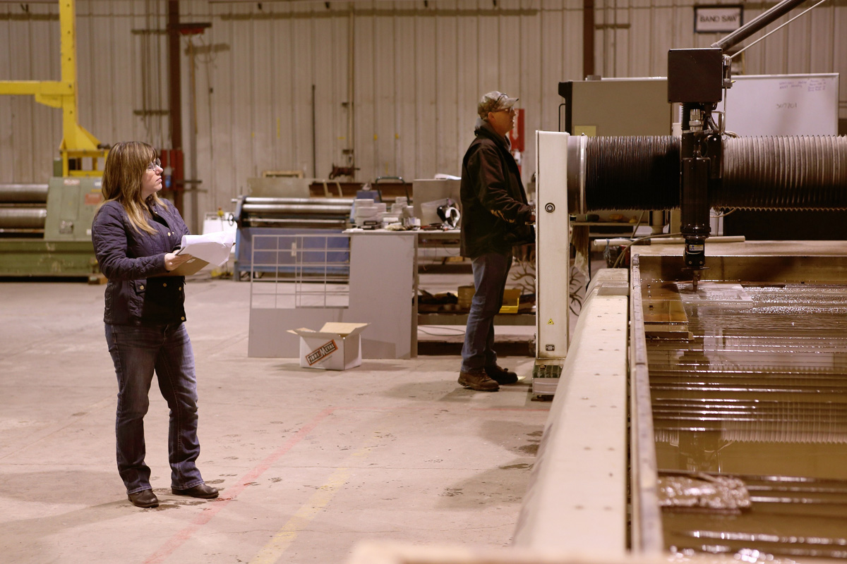 Rebecca McClellan manages production in the workshop at Diversified Metal Products in Idaho Falls.
