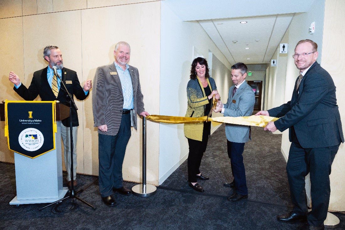 BCIF Executive Director and IOURMR Director of Medical Research cut the ribbon to the newly named research office.