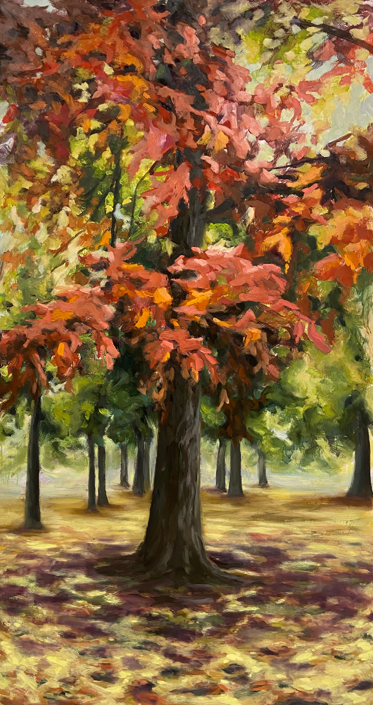 Painting of trees with red leaves in front and green in back.