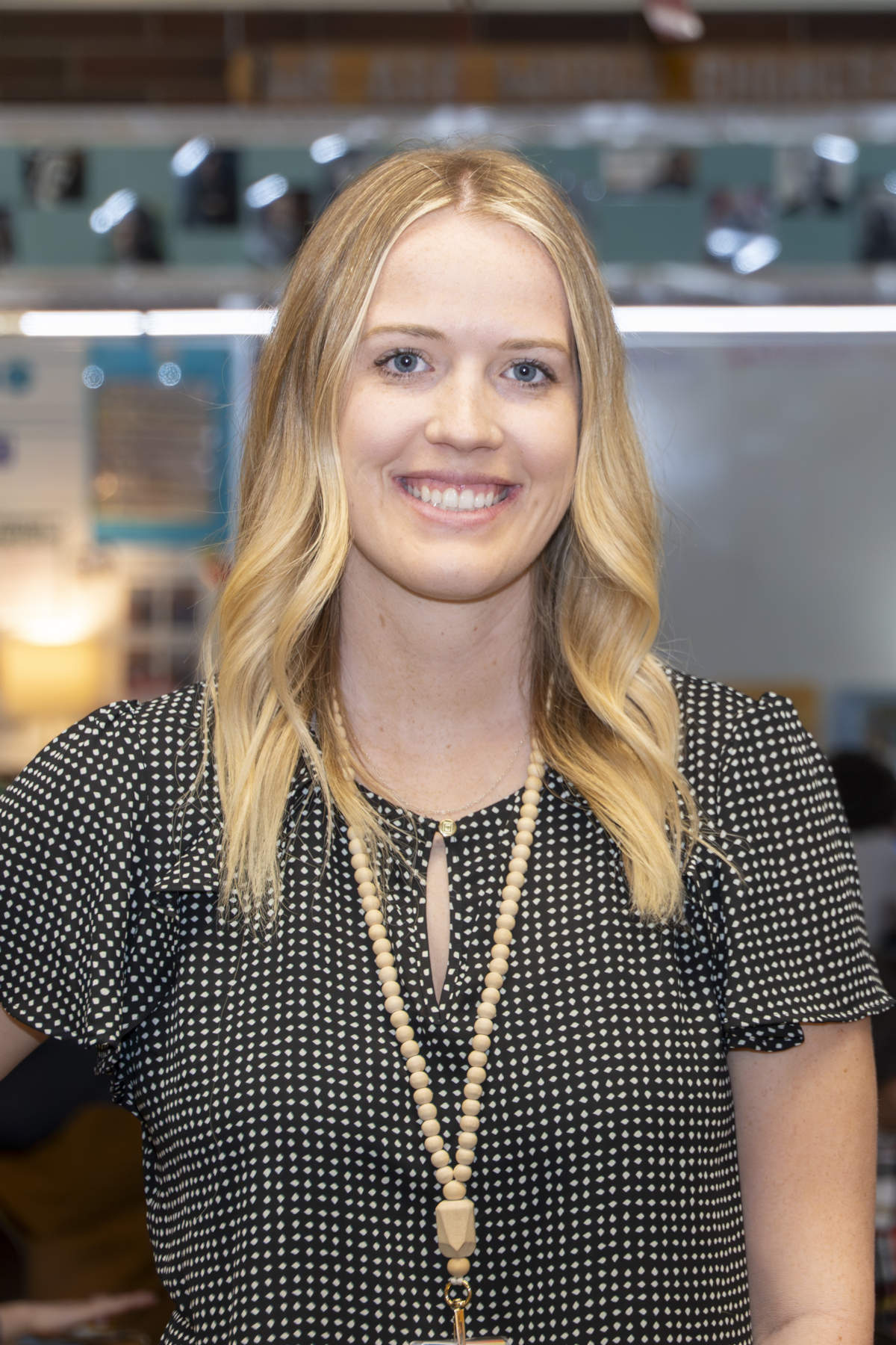 Portrait of a smiling blond woman.