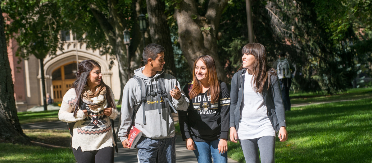 Students walking on campus, Office of Multicultural Affairs