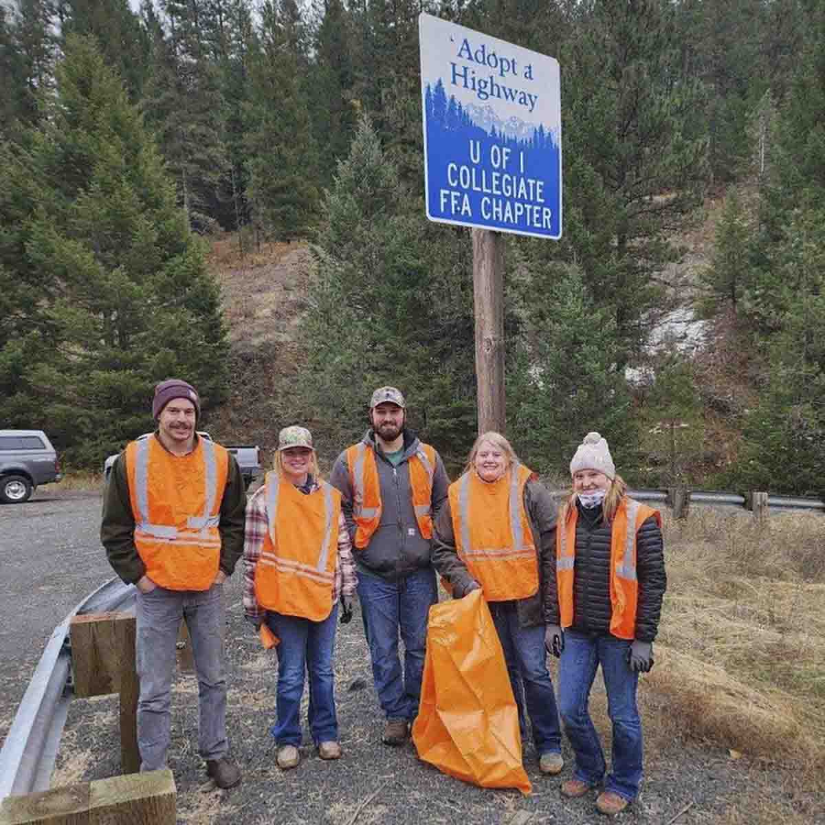 A group with orange vests.