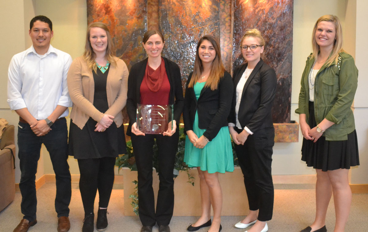 Distinguished International Service Award winner with International Studies students