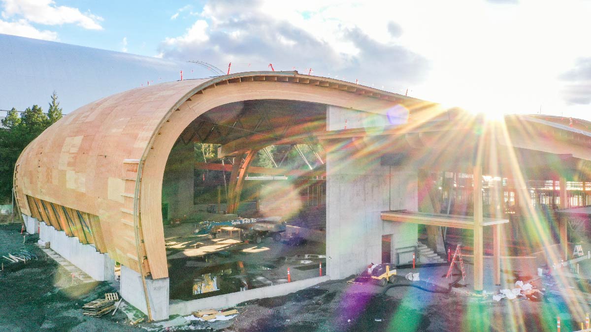 A view of the eastern entrance of the ICCU Arena on a sunny day during construction.
