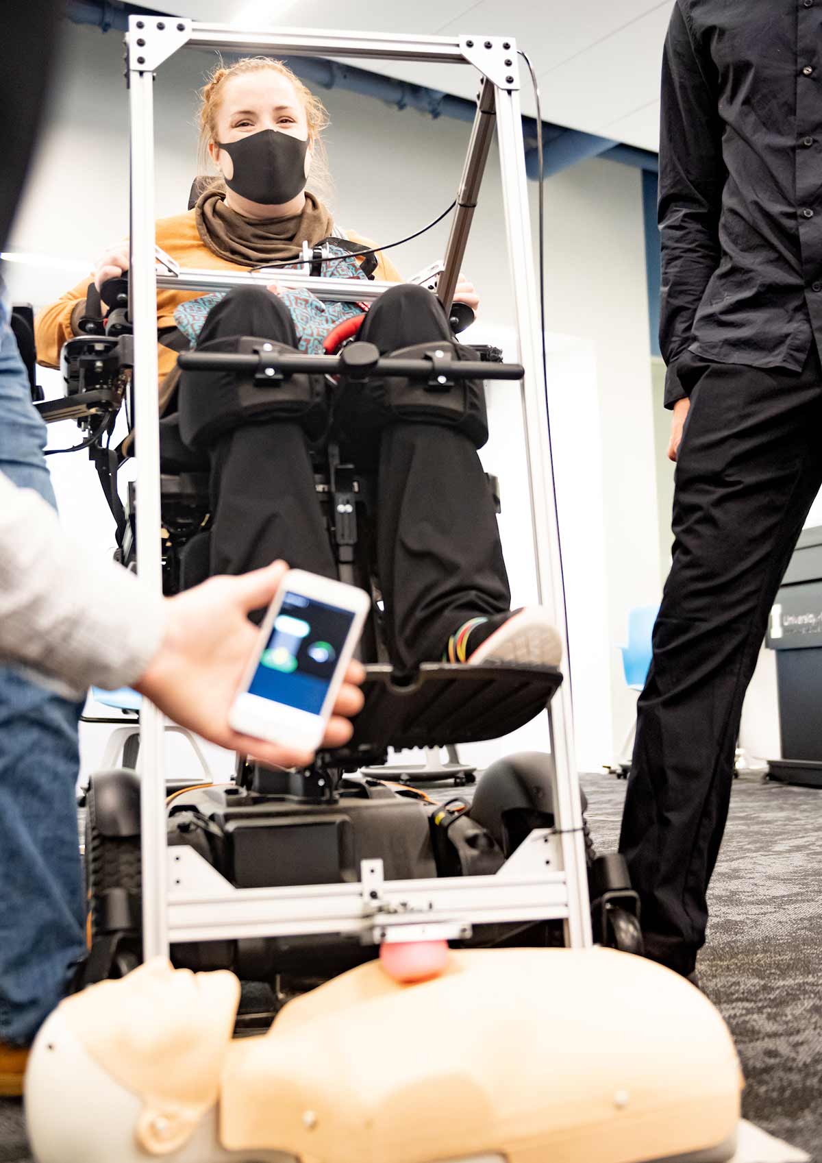 A cell phone application displays readings generated by the assistive CPR device as its in use.