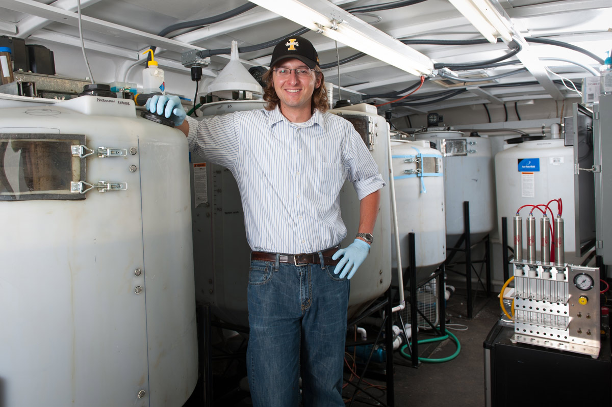 University of Idaho Civil Engineering graduate student Nick Guho in a mobile lab to convert cow manure to plastic