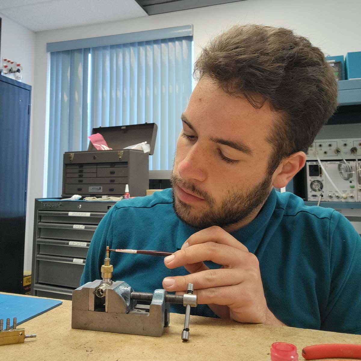Burrows working in a lab.