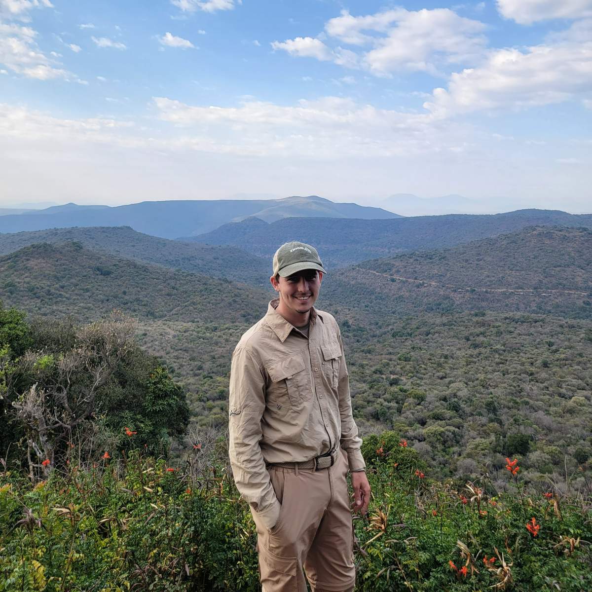 Young man in khaki colored clothing