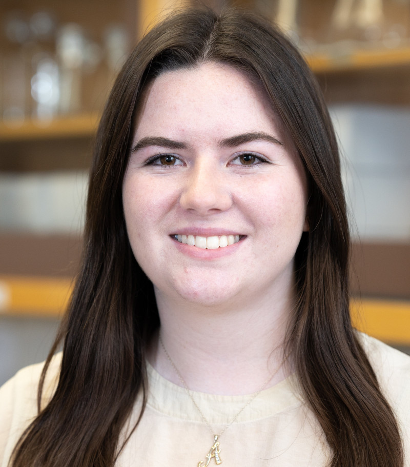 Mugshot of dark-haired female student 