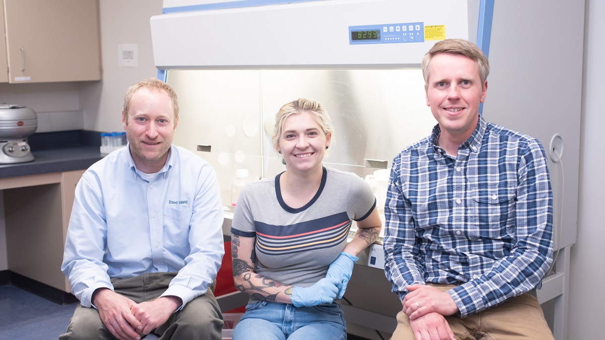 Faculty mentors Peter Fuerst and Nathan Schiele join student LeeAnn Hold in the lab